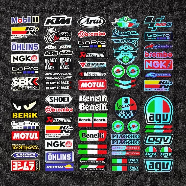 many different stickers and decals on a black background