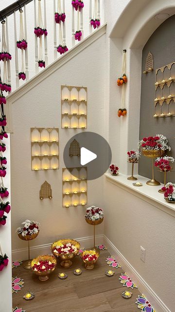 a staircase decorated with flowers and candles