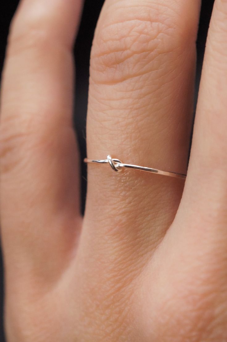 This stacking Knot ring is really cute and easy to wear! The closed wire knot adds a bit of extra detail to this otherwise simple hammered stacking ring. This is one single length of Sterling Silver metal that is knotted into a tight, closed knot and soldered around the back. This ring is a great alternative to a stack Minimal Rings Silver, Simple Ring Silver, Minimalist Rings Silver, Delicate Silver Jewelry, Silver Rings For Women Simple, Small Rings Simple, Cute Rings Silver, Simple Jewelry Silver, Rings Simple Silver