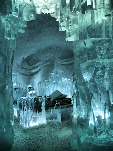 an ice cave with large chunks of ice in it