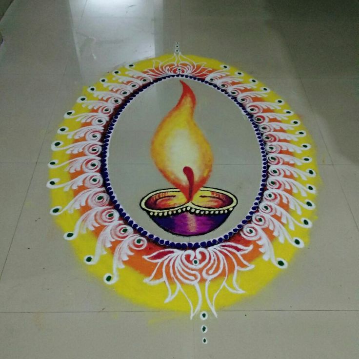 a colorful rangdi design on the floor