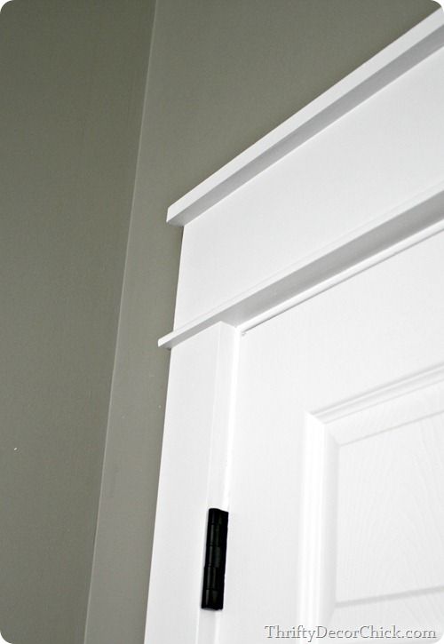 a white door with a black handle on it