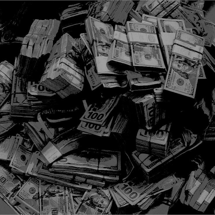 black and white photograph of money piled on top of each other in a pile,