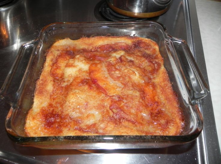 a casserole dish sitting on top of a stove