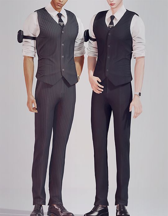 two male mannequins dressed in black and white clothing, one wearing a vest