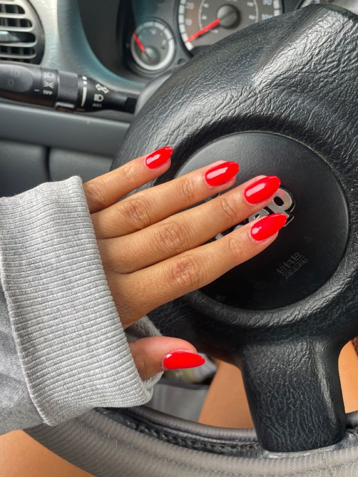 Round Red Nails Acrylic, Lucky Red Nails, 4th Of July Red Nails, Full Red Acrylic Nails, Popular Red Nails, Bright Red Matte Nails, Red Oval Acrylic Nails Designs, Red Nails Acrylic Almond Short, Red Almond Nails Summer