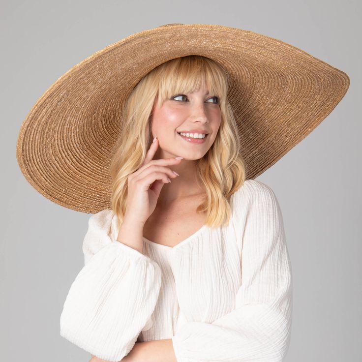 Make a statement in this wheat straw hat with oversized Brim Size: 9". Perfect for the extra coverage at the beach or a statement piece at the pool. Trust us when we say this hat has you covered! Features: Brim Size: 9" Sun Protection: UPF 50+ Adjustable Size: 57cm Material: 100% Wheat Straw Chicken Hats, Bridal Bachelorette Party, Bride Hat, Wide Brim Sun Hat, Large Hats, Fall Hats, Wheat Straw, Beautiful Hats, Farm Rio