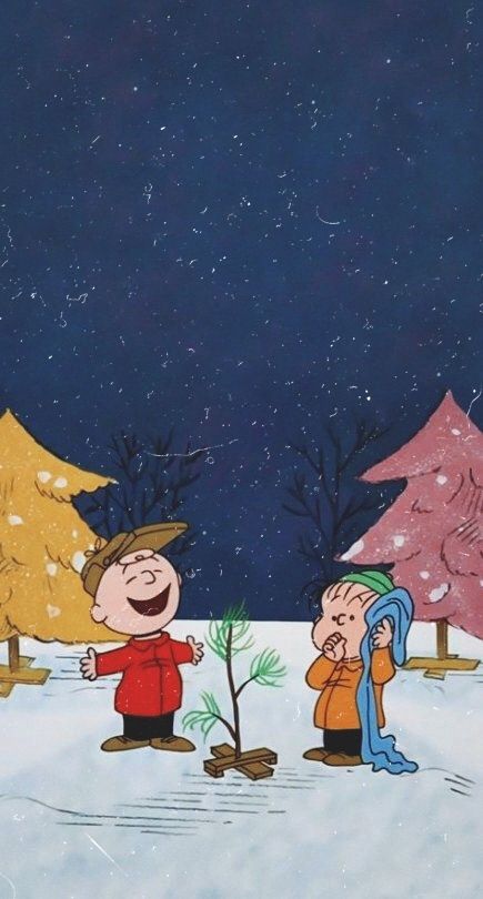 charlie brown and his friends are in the snow by some trees with their hands together