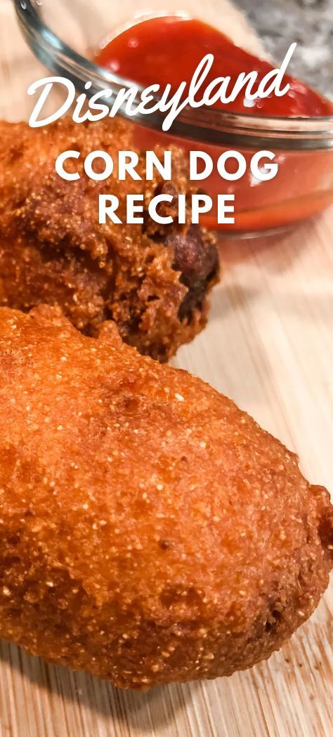 two fried food items on a cutting board with the words disneyland and corn dog recipe