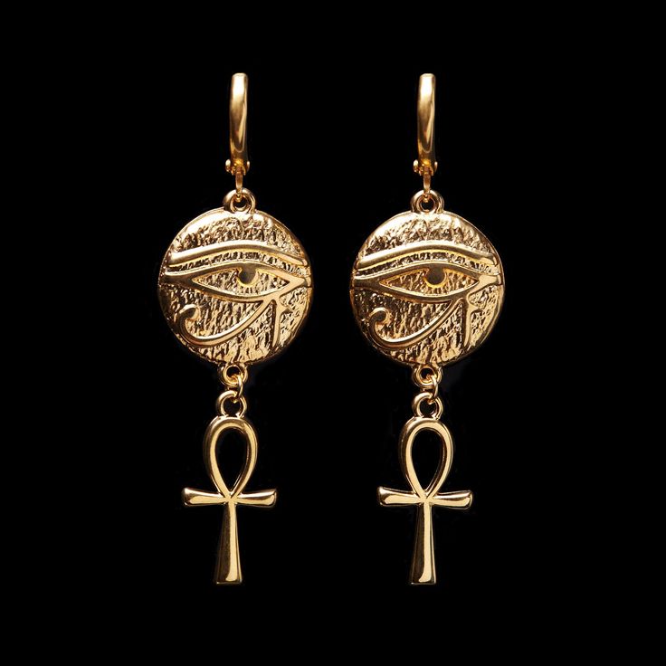 "Treat yourself or a loved one to these beautifully made earrings. The earrings are 1 3/8\" long (4.4cm). They are made of 24K gold plated brass and are expensive-looking. Choose the earrings quantity (single - 1 earring or a pair - 2 earrings) from the drop-down menu when you add items to the cart. For more of the Egypt theme jewelry: https://www.etsy.com/ca/shop/LeafOnWaterStudio?search_query=Egypt  You will receive your earrings carefully packed and ready to gift. I will include a message by request  ★ See all of our items at https://www.etsy.com/ca/shop/LeafOnWaterStudio ★ The sold jewelry is not made of solid gold and is only gold plated. To extend the life of your jewelry please keep it away from water and chemicals ★" Egyptian Style Jewelry, Symbolic Metal Jewelry With Matching Earrings, Symbolic Teardrop Jewelry With Matching Earrings, Symbolic Metal Dangle Earrings, Symbolic Dangle Jewelry With Ear Wire, Symbolic Drop Earrings With Ear Wire, Nickel-free Ankh Earrings As Gift, Nickel Free Ankh Earrings For Gift, Symbolic Dangle Plug Earrings For Pierced Ears