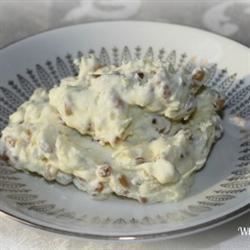 a plate that has some kind of food in it on top of a tablecloth