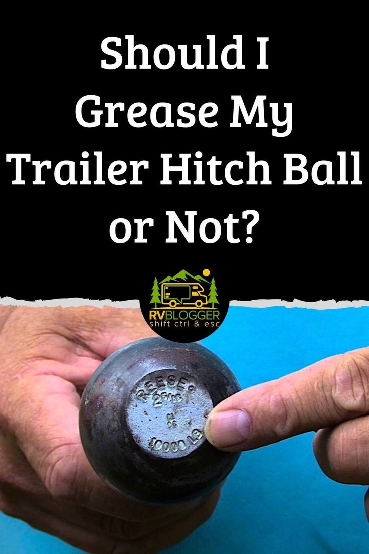 two hands holding an object with the words should i grease my trailer hitch ball or not?