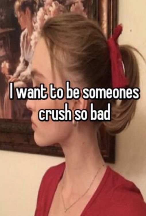 a woman with her hair in a bun and the words i want to be someones crush so bad