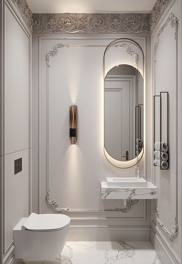 an elegant bathroom with marble floors and walls