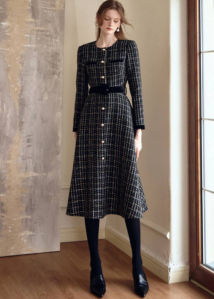 Indulge in luxury with the Shirley Black Long Sleeve Plaid Tweed Midi Dress. Made for sophisticated women who appreciate classic style, this midi dress features a chic plaid pattern and timeless tweed fabric. With long sleeves and a neckless design, it's the perfect addition to any fashionable wardrobe. Elevate your look with this exclusive dress. Long sleeves Neckless It comes with a belt Front buttons Back zip closure Fit-flare dress Item #472201 Long Sleeve Tweed Dress, Long Tweed Dress, Womens Winter Dress, English Dresses, Fall Tweed Long Sleeve Dress With Buttons, Black Long Sleeve Tweed Dress For Fall, Winter Long Sleeve Tweed Dress With Buttons, Fall Luxury Long Sleeve Tweed Dress, Chanel Dress Gowns