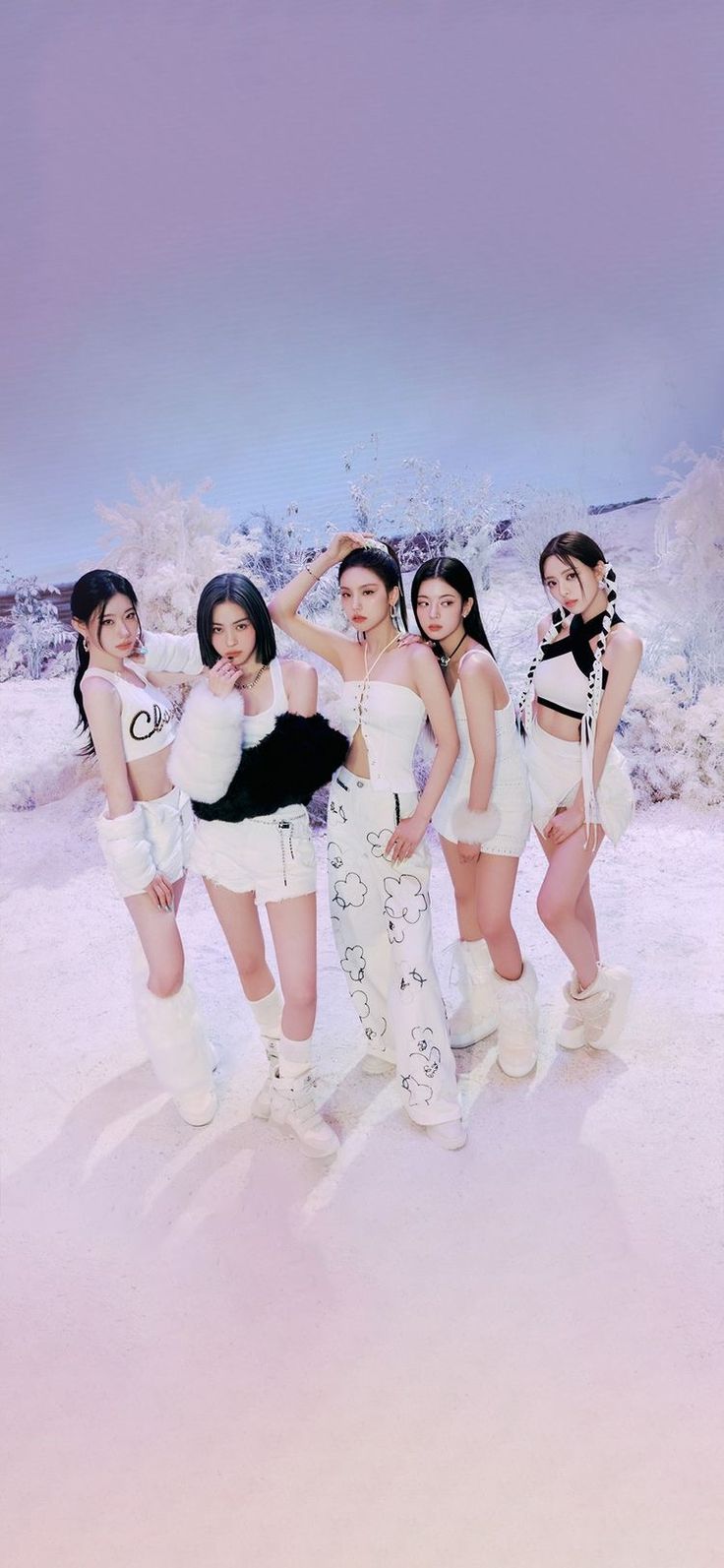 the girls are posing together in white outfits