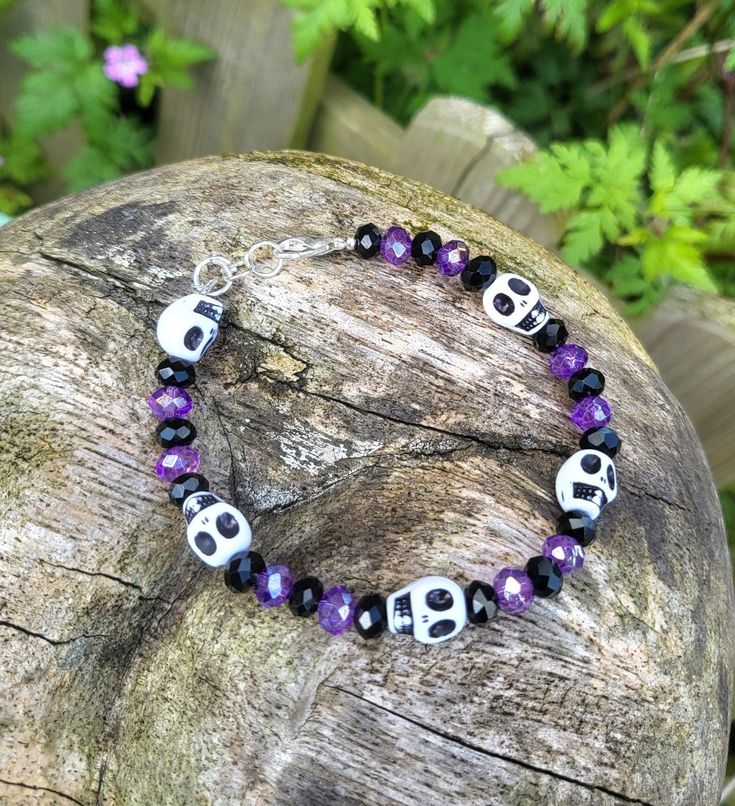 Skull Beaded Bracelet with Silver Metal Fittings THESE HAVE BEEN DESIGNED AND MADE IN-HOUSE. OTHER COLOURS ARE AVAILABLE, AND BULK ORDERS ARE ALWAYS WELCOME. UK CUSTOMERS CAN ENJOY FREE UK SHIPPING. Skull Beaded Bracelet, Skull Bead Bracelet, Halloween Punk Skull Bracelets, Handmade Halloween Festival Bracelets, Handmade Beaded Bracelets For Halloween, Bohemian Handmade Bracelets For Halloween, Handmade Bohemian Bracelets For Halloween, Handmade Halloween Festival Bracelet, Gothic Adjustable Bracelets For Halloween