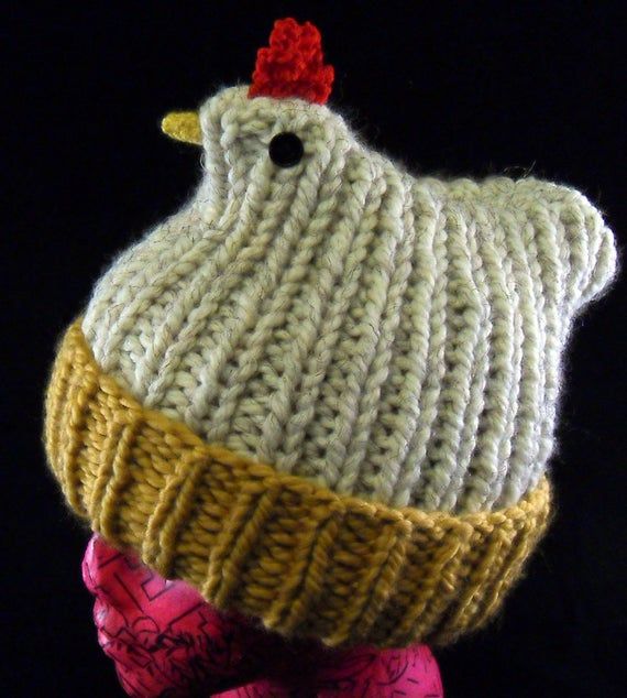 a knitted hat with a chicken on it