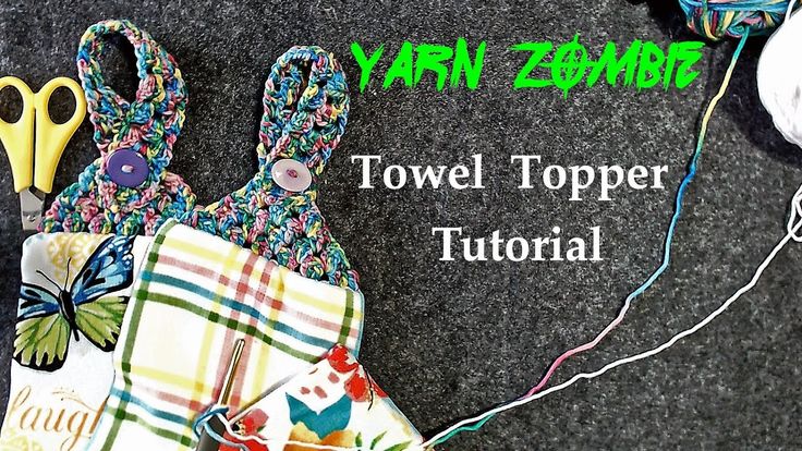 the yarn zombie towel topper is next to crochet scissors and other items