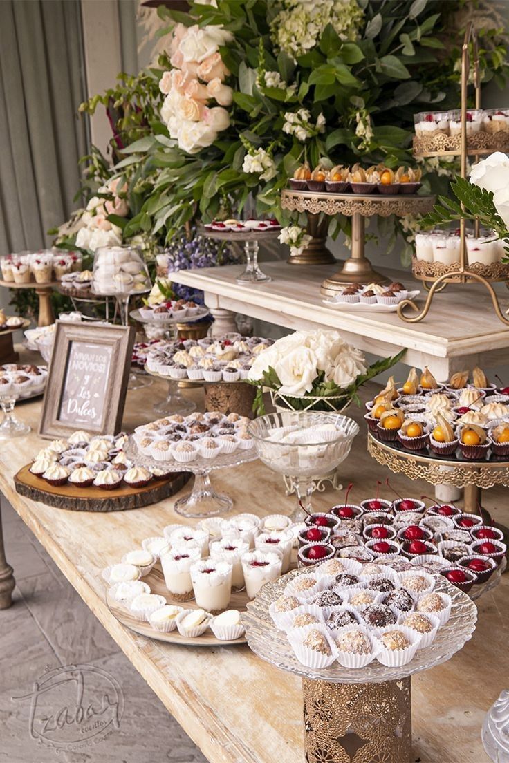 an assortment of desserts and pastries on a table