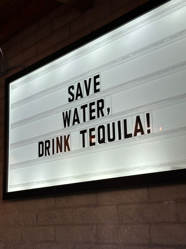 a sign that says save water drink tequila