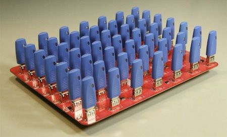 a red and blue board with many pieces of electronic equipment on it