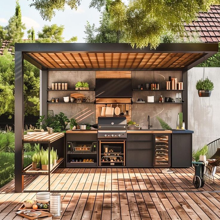 an outdoor kitchen is shown with wood flooring and wooden decking, surrounded by greenery