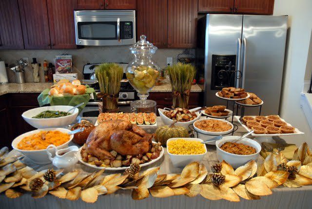 a table filled with lots of food on top of it