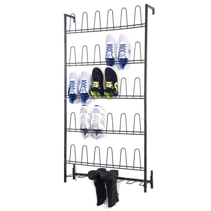 the shoe rack is holding many pairs of shoes