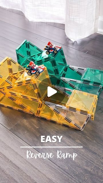 three legos sitting on top of each other with the words easy reverse ramp in front of them