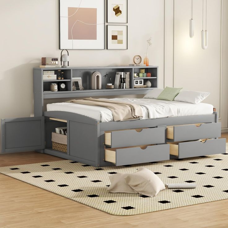 a bedroom with a bed, bookcase and drawers