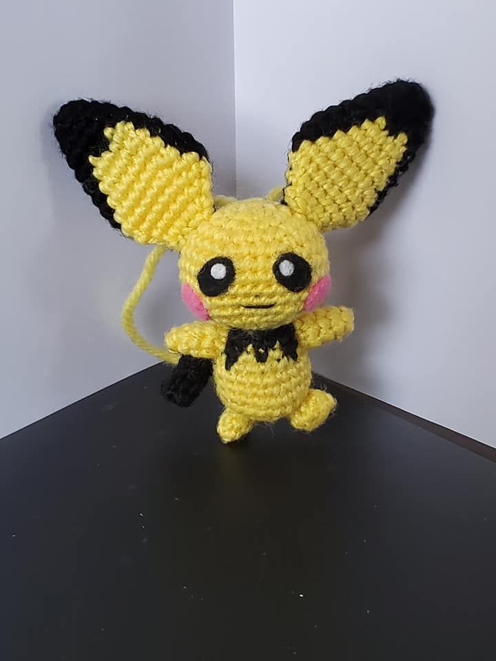 Crochet Pichuu. Click for more angles. Crochet Pokemon Eevee, Evee Pokemon Crochet Pattern, Crochet Celebi Pokemon, Ganger Pokemon Crochet, Crochet Abra Pokemon, Pichu Pokemon, Birthday Presents, Crochet Amigurumi, Pikachu