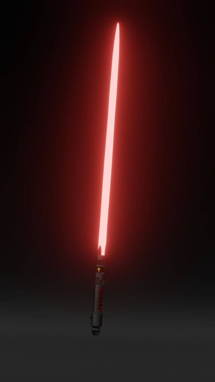 a red light saber is lit up in the dark