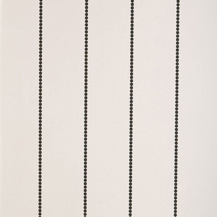 a black and white striped wallpaper with small dots on the bottom half of it