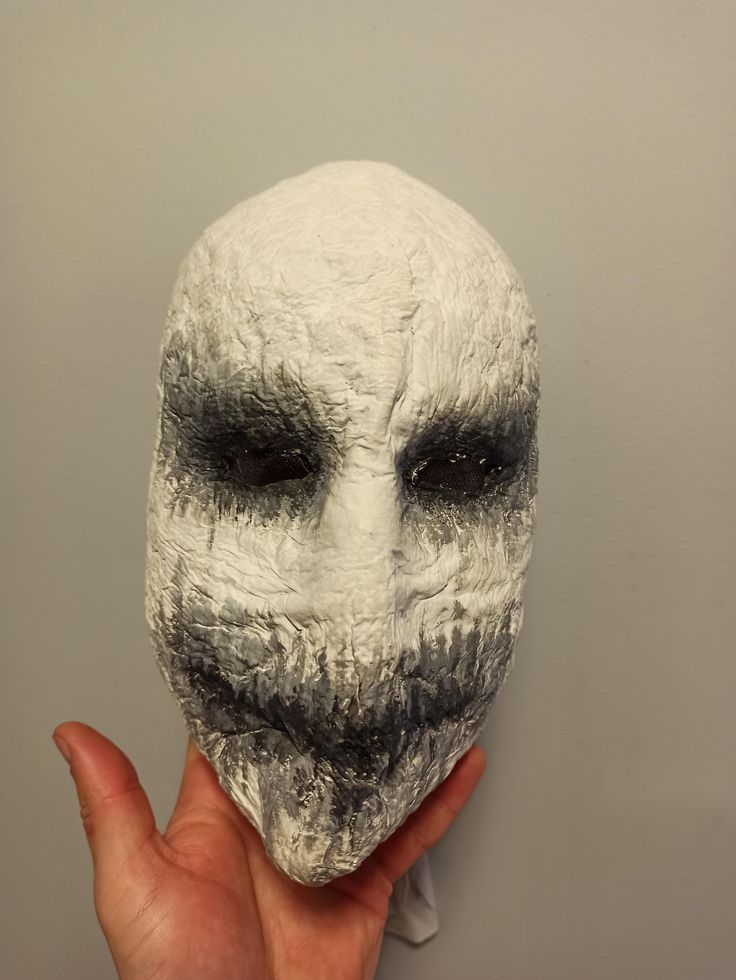 Step into the eerie world of folklore with this one-of-a-kind paper mache (+ plaster  bandage) Slenderman mask, perfect for Halloween, cosplay, or any spooky occasion! Handcrafted with meticulous attention to detail, this mask brings the faceless, enigmatic character to life. Its lightweight and durable design ensures comfort while maintaining a creepy and unsettling look. Features: Handmade from eco-friendly paper mache, plaster bandage, acrylic color Smooth, faceless design, painted white for White Horror Masks For Cosplay Events, Diy Halloween Mask Paper Mache, Paper Mache Skull Mask, Scary Paper Mache Mask, Scary Half Face Mask, Paper Mache Masks, Mask Paper Mache, Horror Cosplay, Mask Horror