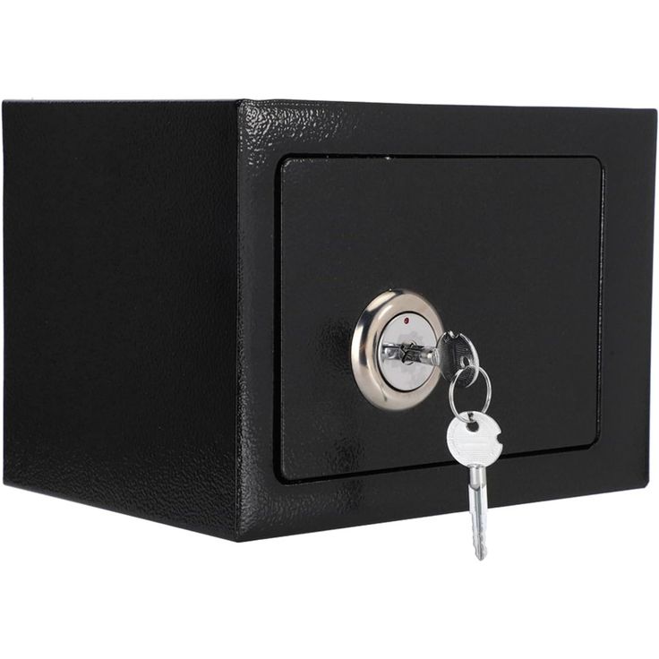 a black safe with a key on it