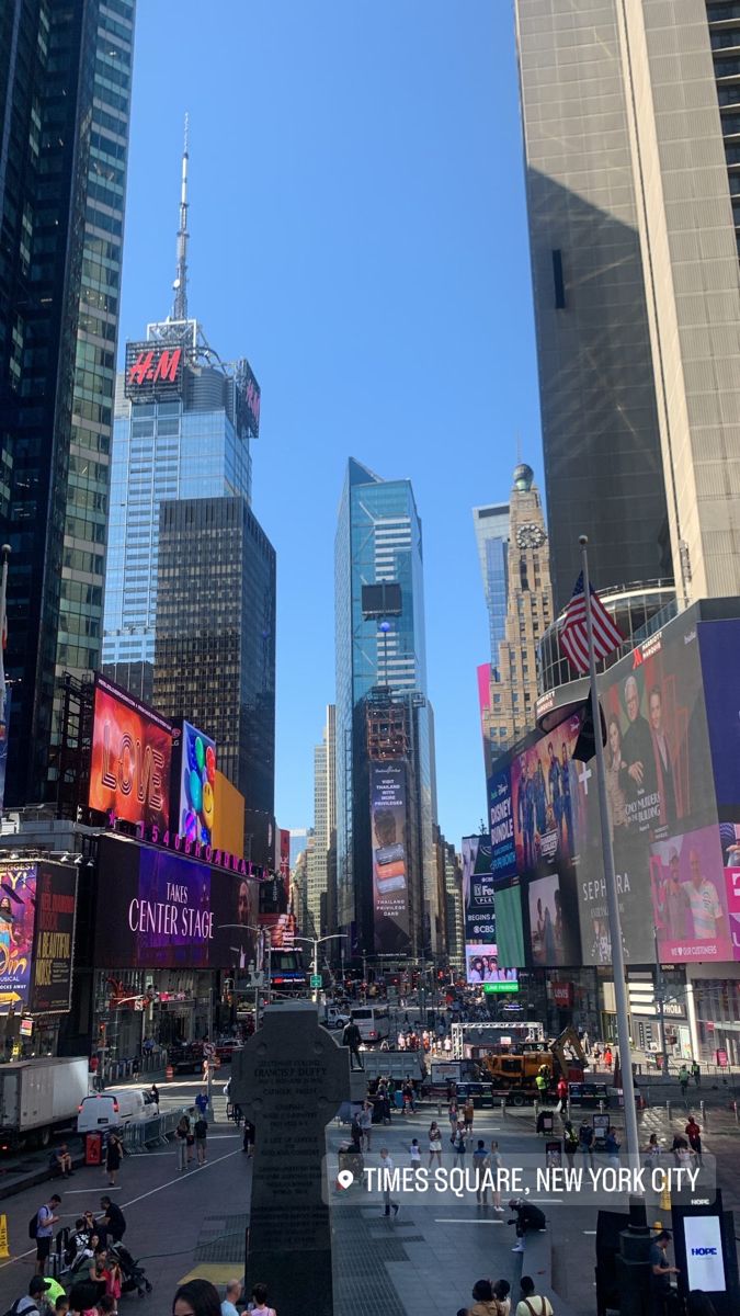 the times square in new york city is crowded with people