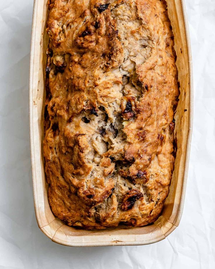 a loaf of bread in a wooden pan