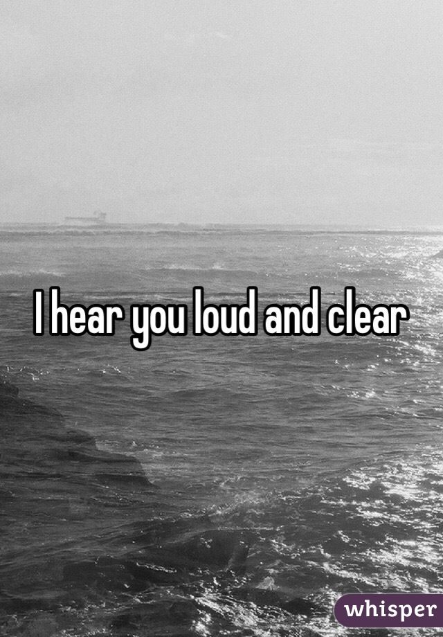 the words i hear you loud and clear are in front of an ocean with waves