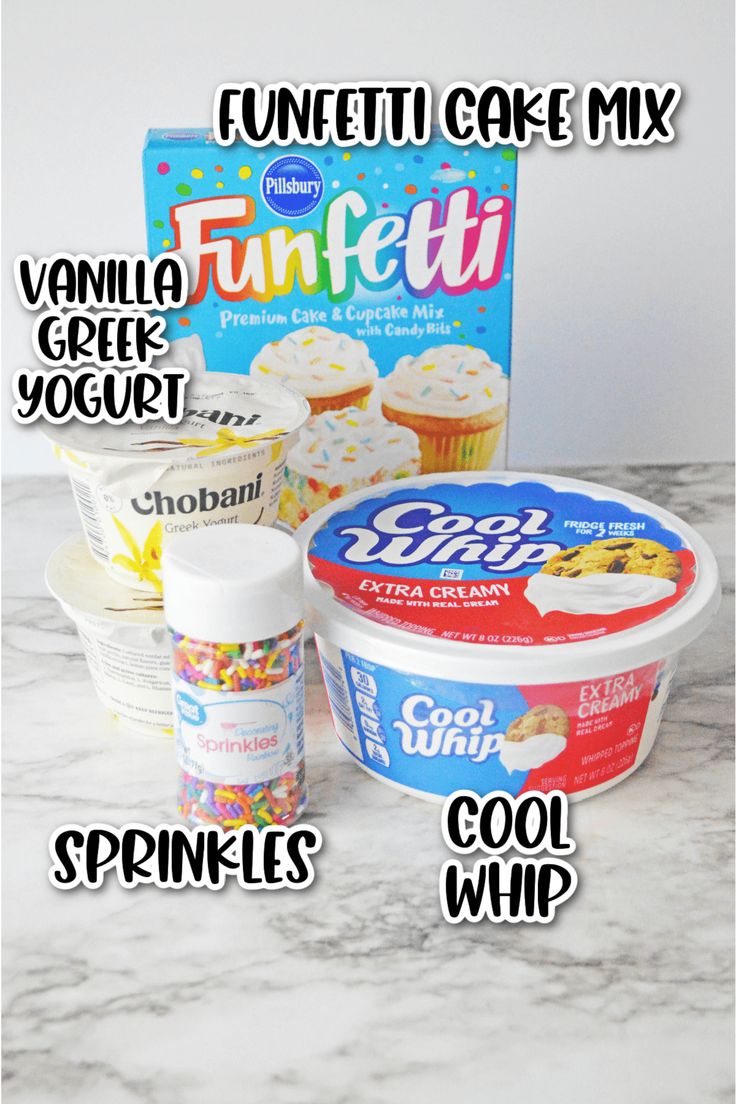 an ice cream container and some cupcakes on a marble counter top with the words funfetti cafe mix