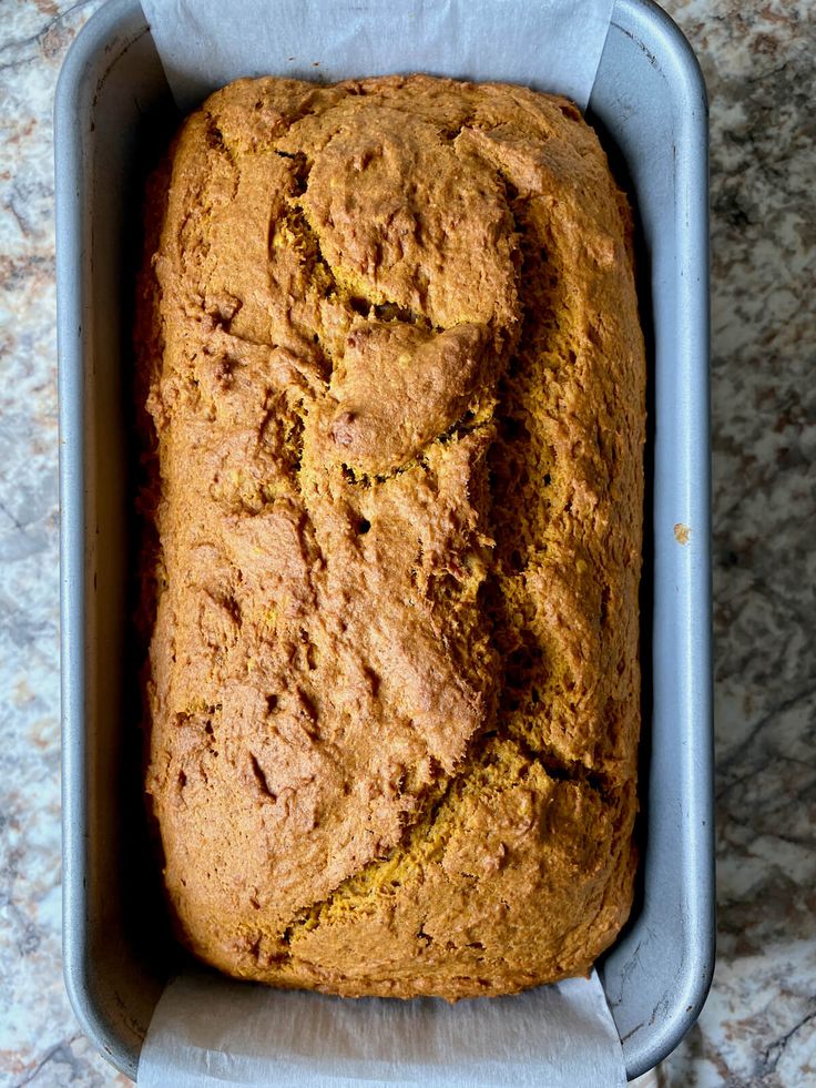 a loaf of pumpkin bread in a pan