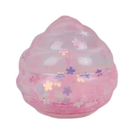 a pink plastic object with flowers on it