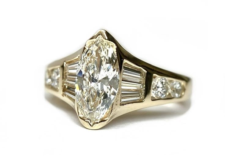 an oval and baguette cut diamond ring