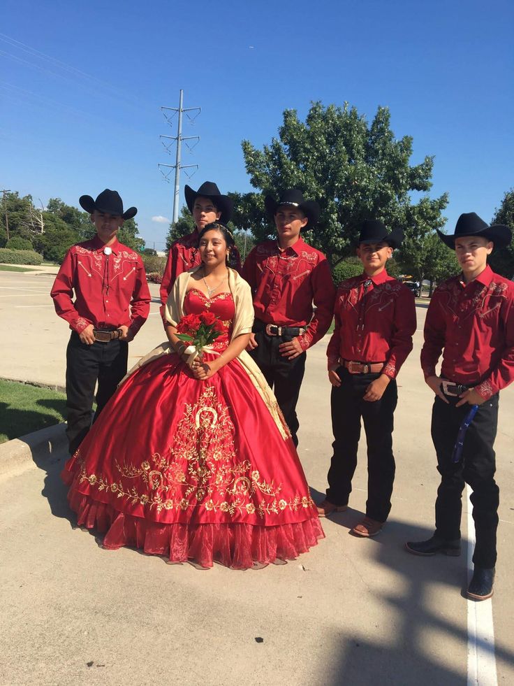 Red Quince Dress With Chambelanes, Quince Chambelanes Outfits Charro, Maroon Quinceanera Chambelanes, Mexican Quinceanera Chambelanes, Quince Charro Chambelanes, Red Quince Outfits, Red And Gold Charro Quinceanera Dresses, Chambelanes Outfits Quinceanera Vaquero Red, Red Vaquero Quinceanera Theme