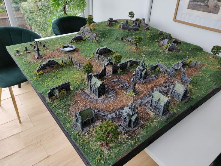 a table that has some sort of terrain on it