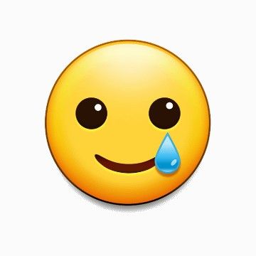 an emoticive smiley face with a drop of water on it's nose