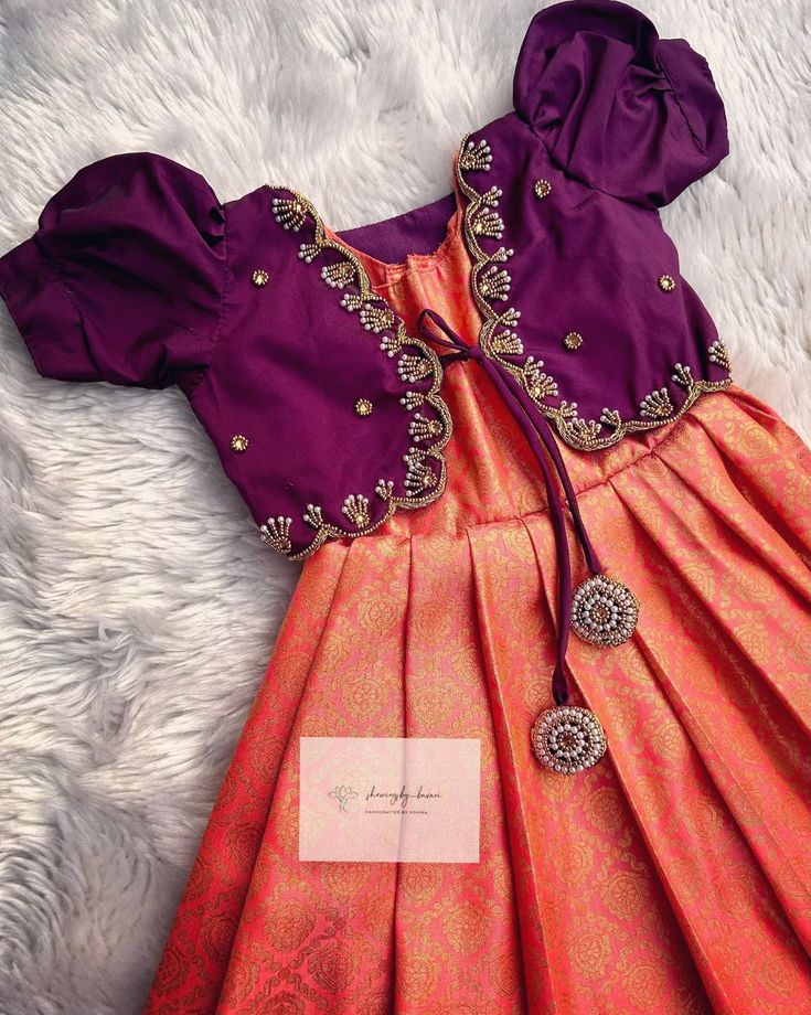 Kanchipuram Silk gown with Golden ⚜️ Aari worked Overcoat 💎 Such an unique colour combo and well finished aari worked overcoat💠 Soft… | Instagram Lehenga Designs For New Born, Pattu Langa For Baby Girl, Pattu Dress For Kids, Frock Designs For Girl Kids, Baby Langa Blouse Designs, Baby Blouse Designs, Baby Pattu Langa Designs, Kids Pattu Langa Blouse Designs, Pattu Langa Blouse Designs For Kids