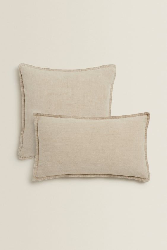 two linen pillows on a white background