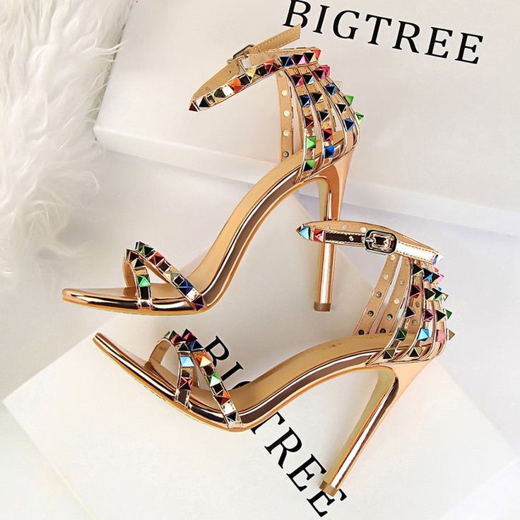 Brand Name:  BIGTREEOrigin:  CN(Origin)Heel Height:  Super High (8cm-up)With Platforms:  NoOccasion:  PartySandal Type:  Modern SandalsUpper Material:  PUHeel Type:  Thin HeelsLining Material:  PUOutsole Material:  RubberClosure Type:  Buckle StrapBack Counter Type:  Back StrapModel Number:  267-2Pattern Type:  Mixed ColorsSide Vamp Type:  OpenItem Type:  SandalsFit:  Fits true to size, take your normal sizeFashion Element:  RivetStyle:  sexyInsole Material:  PUDepartment Name:  Adult Hak Tinggi, Sandals Patterns, Modern Sandals, Roman Style, Gladiator Heels, Roman Fashion, Studded Sandals, Stiletto Sandals, Wholesale Shoes