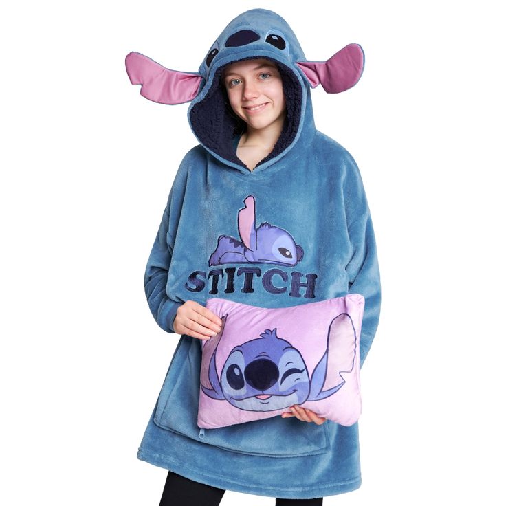 PRICES MAY VARY. Disney Design - This Disney blanket hoodie for kids is the ultimate blend of comfort, style, and versatility. It transforms into a convenient travel pillow, ensuring they stay snug and at ease wherever their adventures take them. Choose from a range of designs 7 in 1 Portable Travel Pillow - Unzip the kangaroo pocket and effortlessly fold the hoodie blanket inside, transforming it into a cosy soft pillow. Whether they’re taking a flight, or a road trip, this versatile accessory Gifts On Amazon, Stitch Gifts, Disney Blanket, Backpack Art, Stitch Blanket, Fit Kids, Kid N Teenagers, Stitch Gift, Disney Hoodies